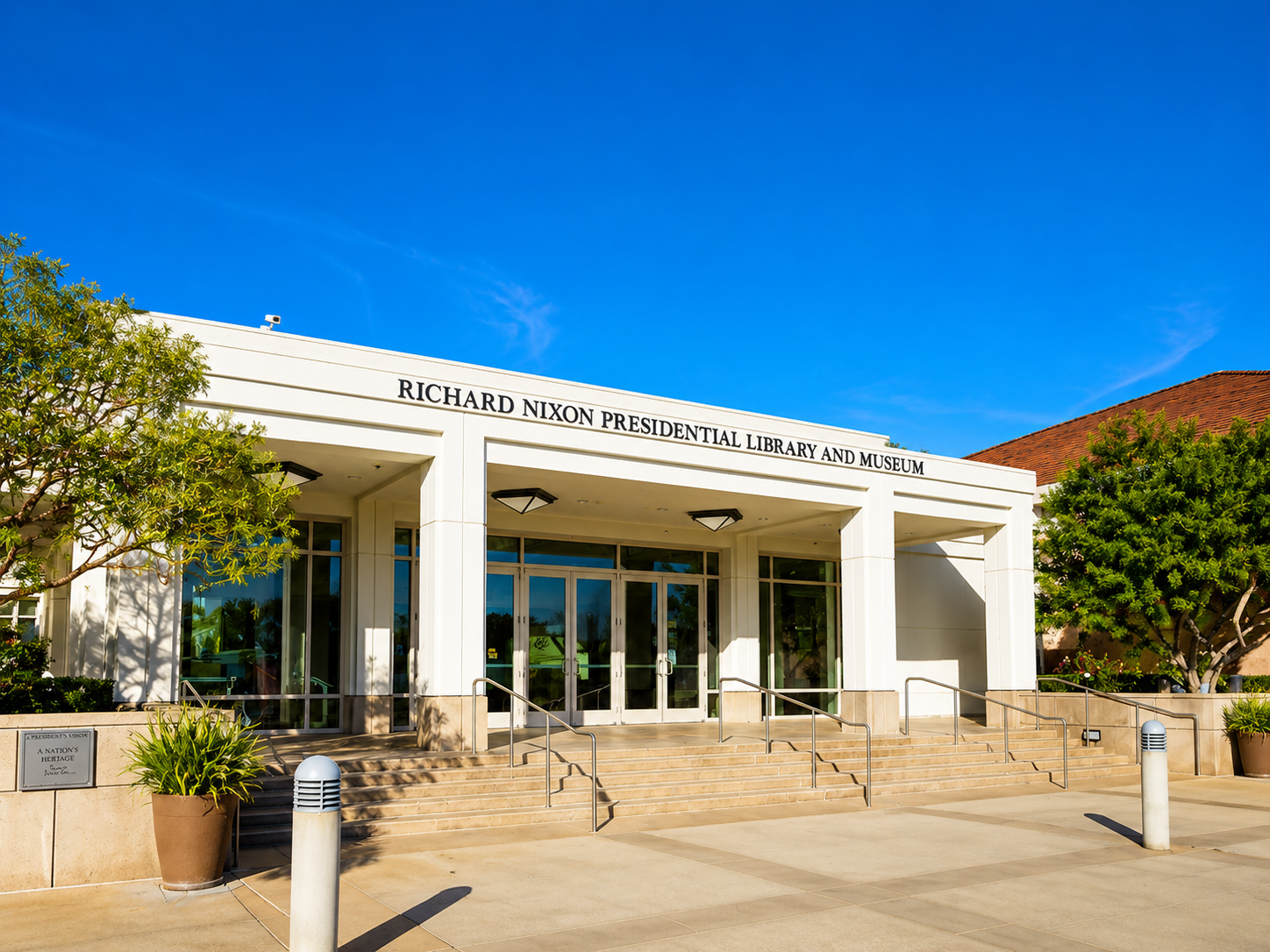 Modern architectural entrance of the Nixon Library during operating hours in Yorba Linda
