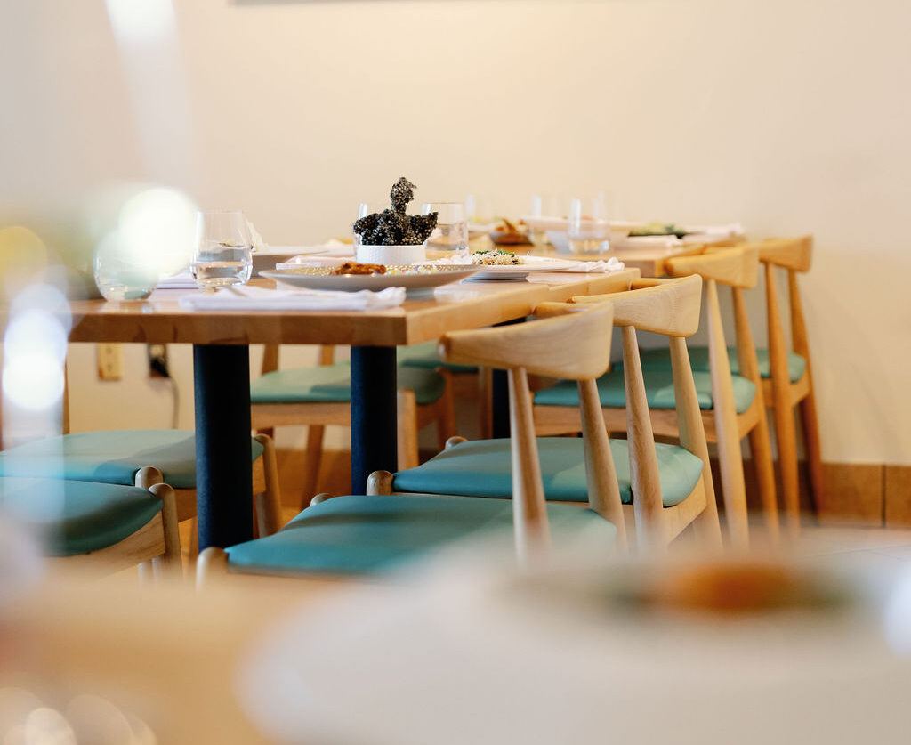 Elegant July 4th holiday table setting with artisanal fusion dishes at a boutique restaurant in Yorba Linda